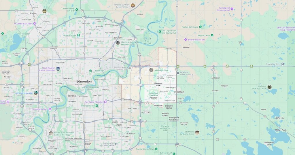 Detailed map of Edmonton showing city streets, rivers, and public transit routes with various landmarks and neighborhoods.